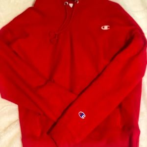 Ladies small red champion hoodie.
